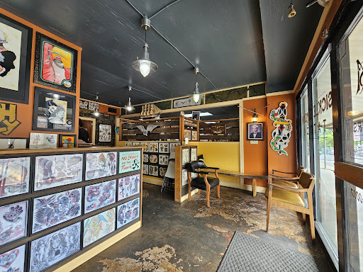 Explore tattoo ideas on thigh, creative tattoo ideas in Columbia, available at Sickle and Moon Tattoo