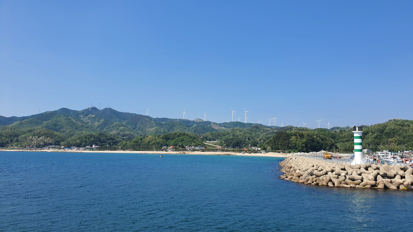 Photo de Deoksin Beach et le règlement