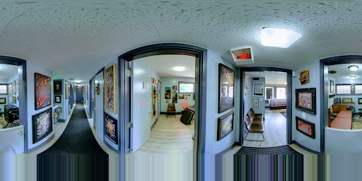 Find leg tattoo ideas for guys for your next unique tattoo in Rockford at Euro Tattoo