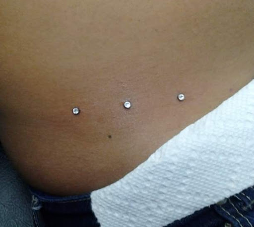 Explore men's skull tattoo ideas, creative tattoo ideas in Hialeah, available at Allstar Tattoo & Body piercing