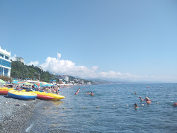 Foto di Profug beach con costa lunga e dritta