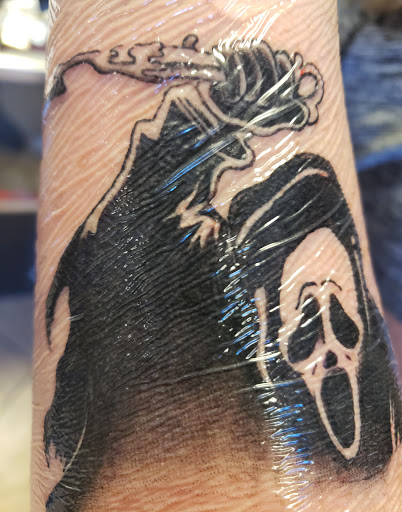 Explore anunnaki tattoo ideas, creative tattoo ideas in Glendale, available at Ritual Addictions Tattoo and Piercing