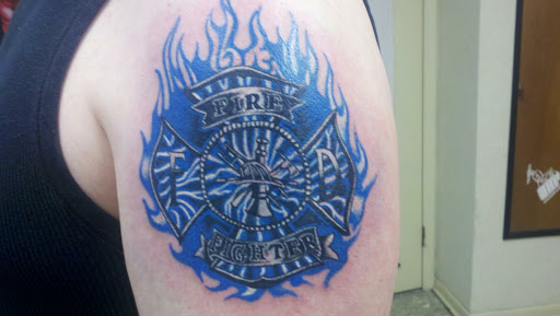 Explore tiger lily tattoo ideas, creative tattoo ideas in Muncie, available at The Tattoo Studio