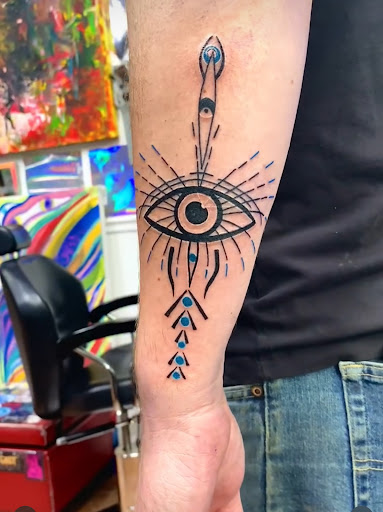 Explore tattoo ideas and designs for men, creative tattoo ideas in Ridgewood, available at Cosmic Wizard Tattoo & 3DUV Gallery