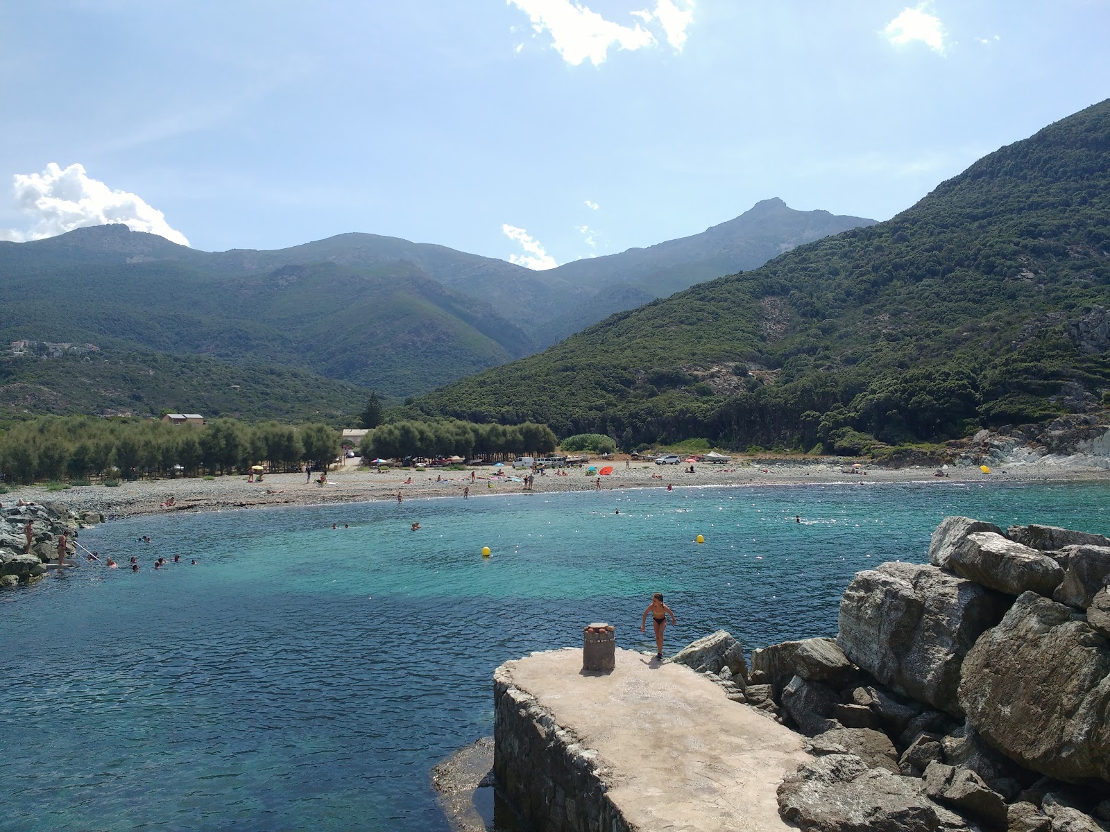Photo of Giottani beach with rocks cover surface