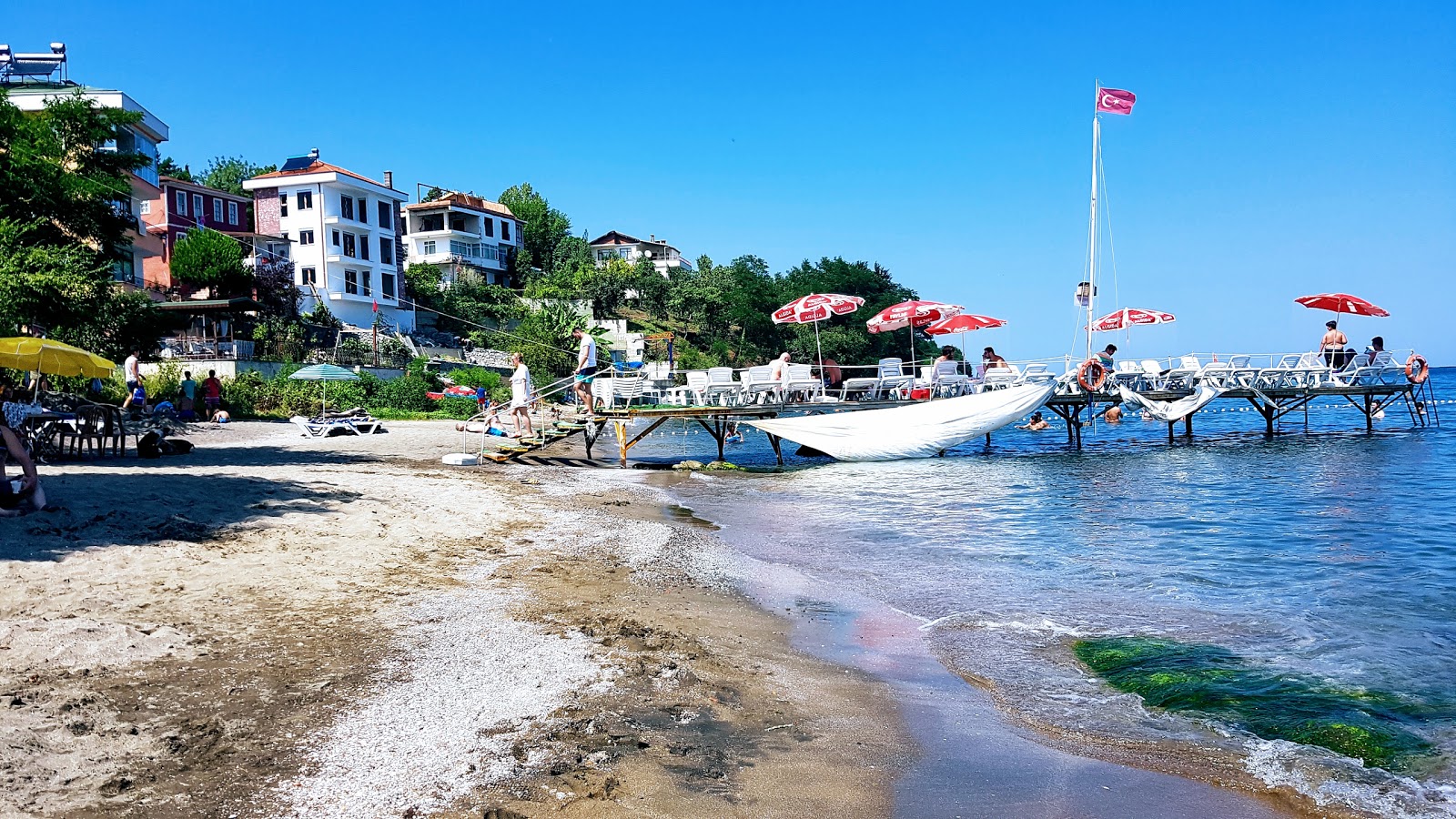 Foto von Deniz Kabugu Plaji mit grauer sand Oberfläche