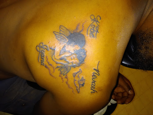 Explore john wayne tattoo ideas, creative tattoo ideas in Bowling Green, available at Taboo Tattoos and Piercings