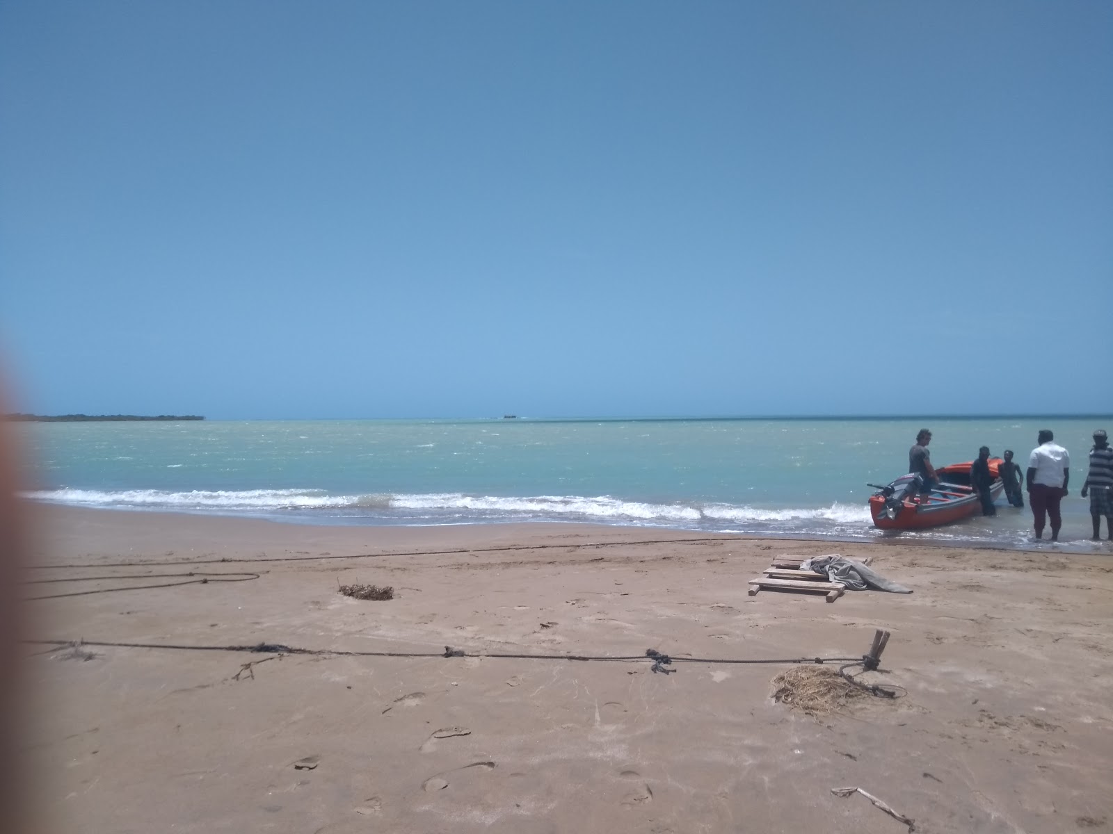 Photo of Parottee Bay with bright sand surface