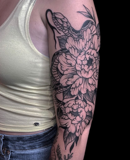 Explore chaos tattoo ideas, creative tattoo ideas in Johnson City, available at Gold Cross Tattoo Co.