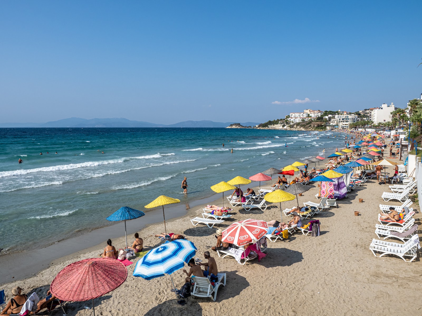 Foto av Kusadasi Ladies beach med fin beige sand yta