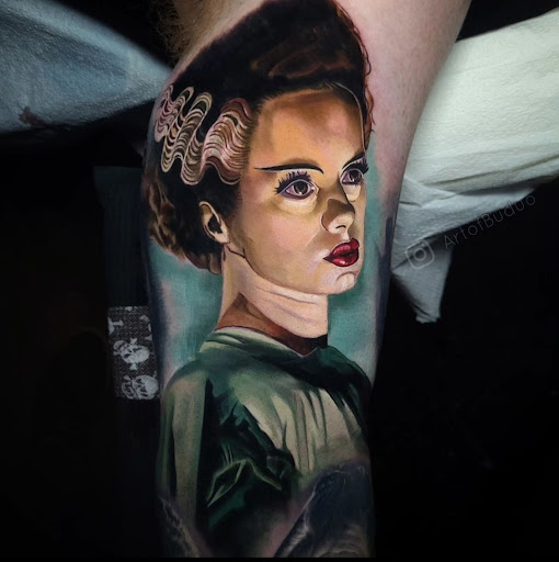 Explore feminine cross tattoo ideas, creative tattoo ideas in Worcester, available at Studio 31 Tattoo Social Club