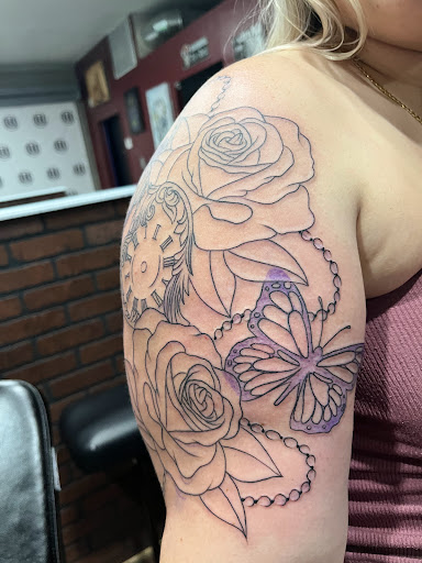 Explore tattoo ideas for black women, creative tattoo ideas in Cape Coral, available at UNRIVALED INK