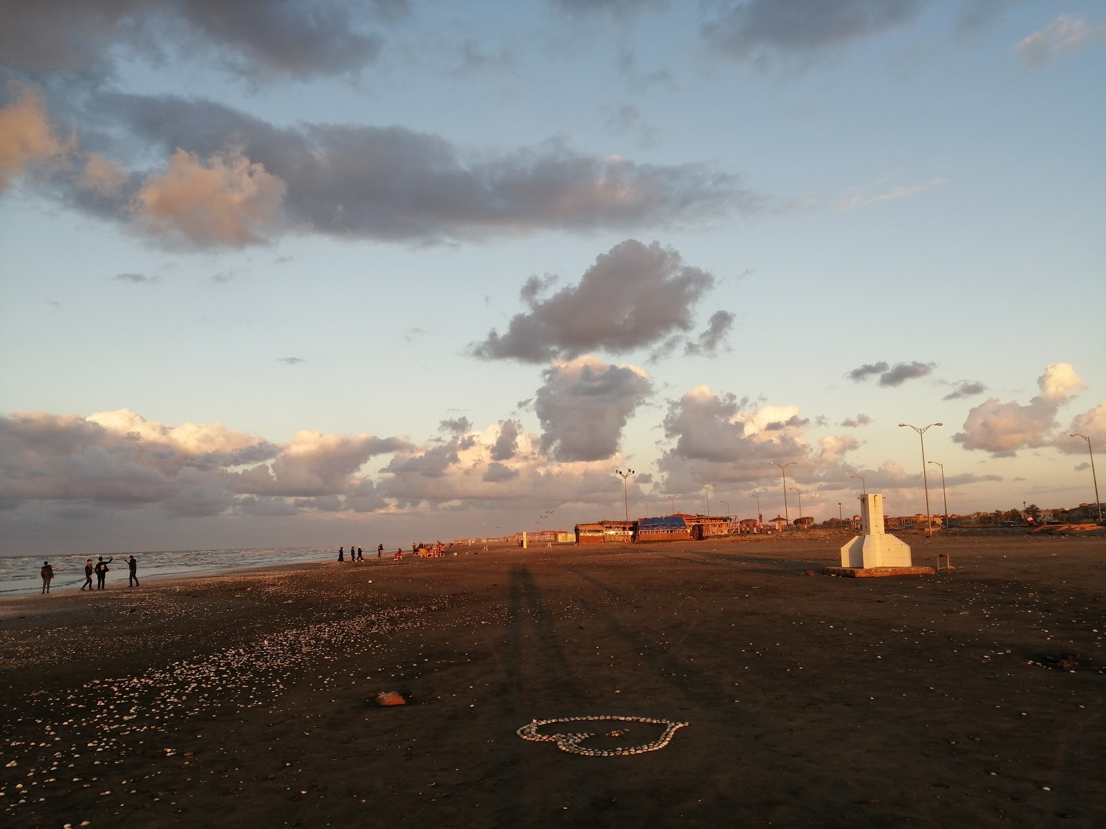 Photo de New Damietta Beach avec l'eau cristalline de surface