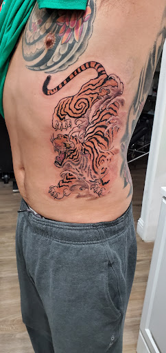 Explore brown pride tattoo ideas, creative tattoo ideas in Fresno, available at Happy Client Tattoo