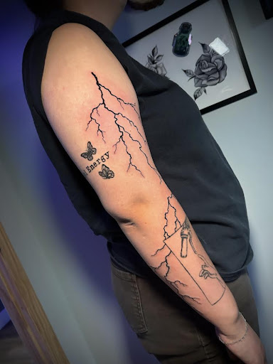 Explore shoulder tattoo ideas for women, creative tattoo ideas in Adrian, available at Ambition Ink