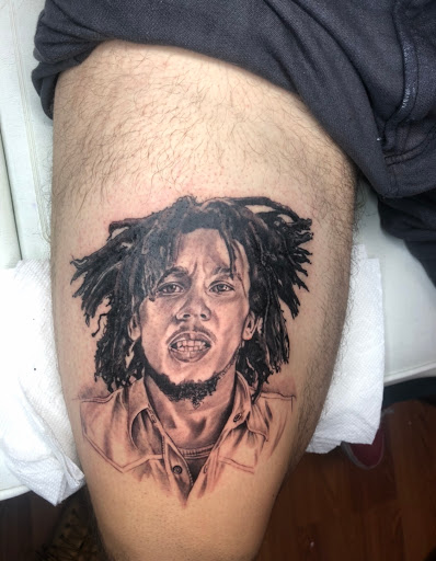 Explore wife name tattoo ideas for husband, creative tattoo ideas in Bear, available at Ink Envy Tattoo Studio LLC