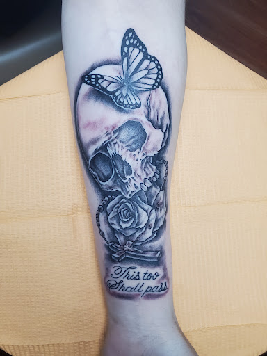 Explore half dollar size tattoo ideas, creative tattoo ideas in Center Line, available at Elite Ink Tattoo Studios