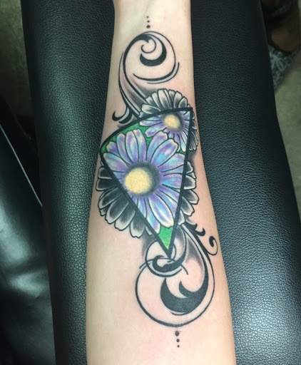 Explore tattoo ideas rib cage, creative tattoo ideas in Clermont, available at Ink Ink Tattoos