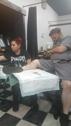 Explore back tattoo ideas for females, creative tattoo ideas in Mcallen, available at Powers Xtrym Ink Tattoos & Piercing Studio