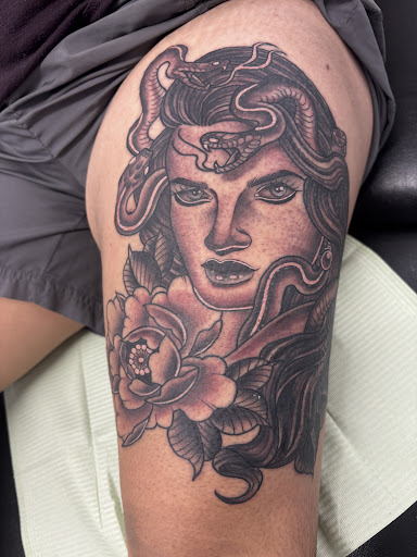 Explore haunted mansion tattoo ideas, creative tattoo ideas in Richmond, available at Lucky Lady Tattoos