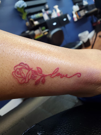 Explore finger tattoo ideas for women, creative tattoo ideas in Cocoa, available at Rorschach Tattoo Shop and Piercing Studio