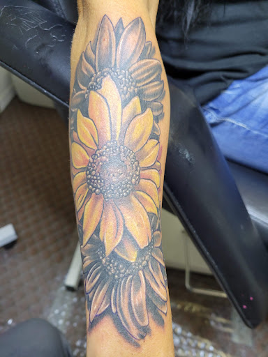 Explore tattoo ideas to fill in gaps, creative tattoo ideas in Angola, available at Hoodlum Ink