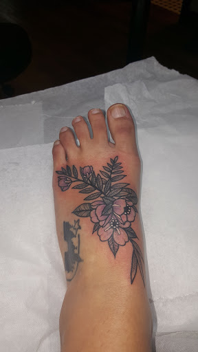 Find inbetween boob tattoo ideas for your next unique tattoo in Vancouver at Hopeless Tattoo & Piercing