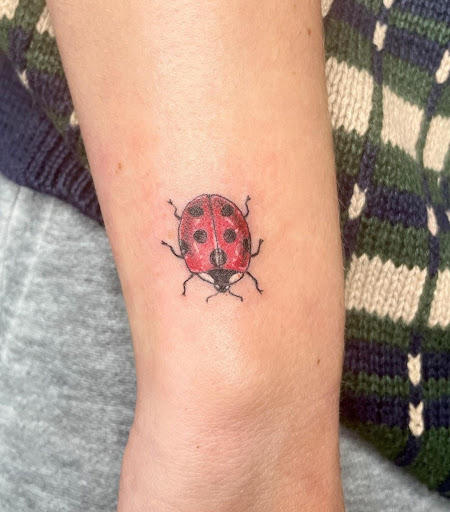 Explore wolf tattoo ideas for guys, creative tattoo ideas in Eugene, available at High Priestess Piercing & Tattoo