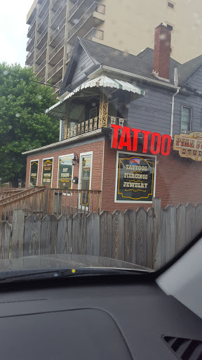 Explore spinal tattoo ideas, creative tattoo ideas in Bridgeport, available at Pike Street Studios Tattoo and Body Piercing