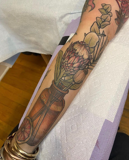 Explore back leg tattoo ideas, creative tattoo ideas in Albany, available at Dead Presidents Lounge