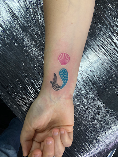 Explore mom tattoo ideas for son, creative tattoo ideas in North Fort Myers, available at Loyal 2 The Coil Tattoos & Body Piercings