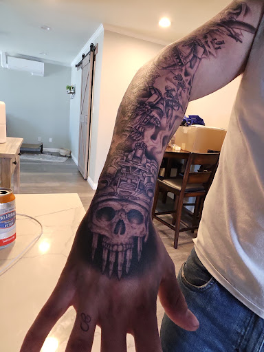 Explore tattoo ideas for a name cover up, creative tattoo ideas in San Diego, available at Above All Tattoo - Pacific Beach