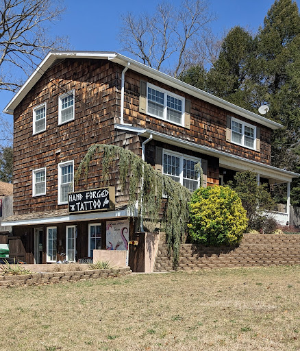 Explore woodstock tattoo ideas, creative tattoo ideas in Brick, available at Hand Forged Tattoo