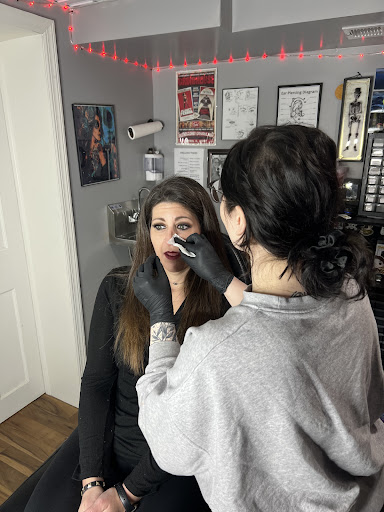 Explore circus tattoo ideas, creative tattoo ideas in Englishtown, available at Battlefront Tattoo Company
