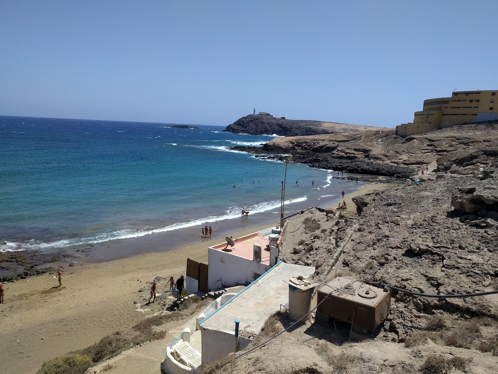 Foto van Playa del Cabron met bruin zand oppervlakte