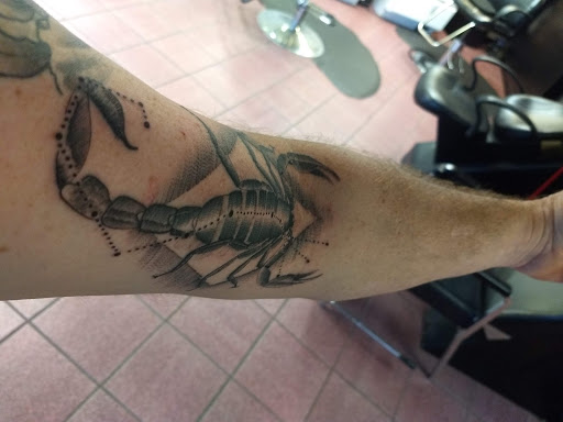 Explore small arrow tattoo ideas, creative tattoo ideas in Longview, available at Fugis Tattoo Shop