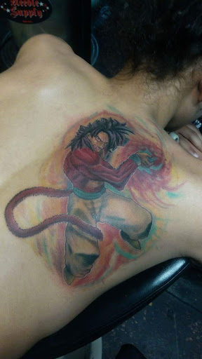 Find underboob tattoo idea for your next unique tattoo in Flint at Big Gunz Tattoos - Flint