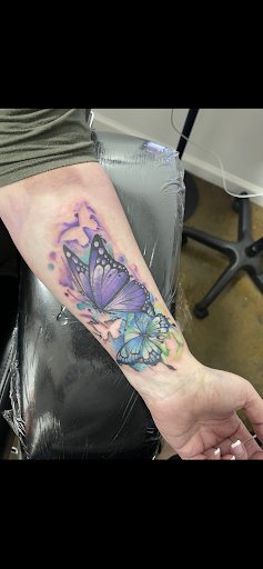 Explore dog tattoo ideas for men, creative tattoo ideas in Roanoke, available at Valkyrie Tattoo Studio