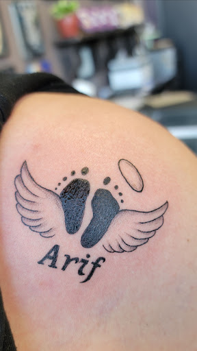 Explore tattoo ideas for black women, creative tattoo ideas in Mcallen, available at The Ink Elephant