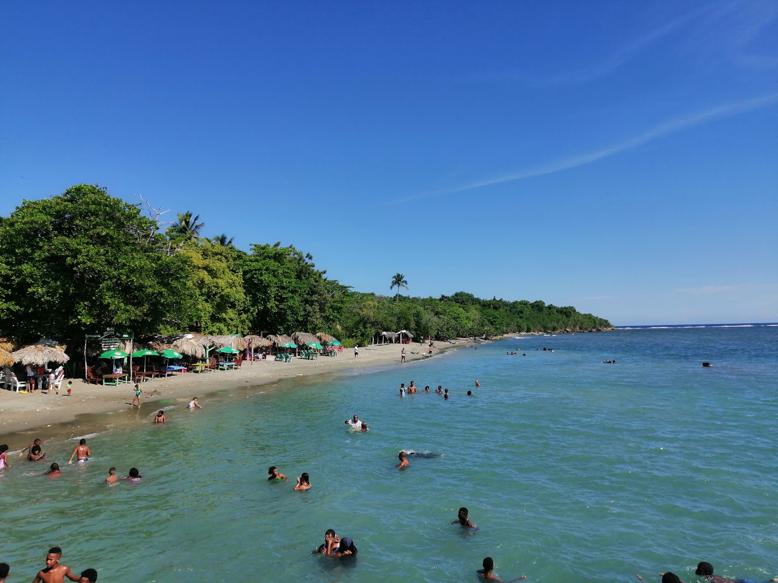Foto af Palenque beach med grå sand overflade