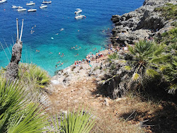 Cala Marinella'in fotoğrafı birden fazla küçük koy ile birlikte