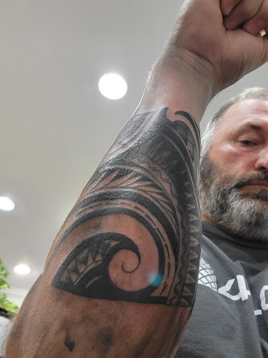 Explore snake tattoo ideas for females, creative tattoo ideas in Port Orchard, available at The Pacific Tattoo Studio