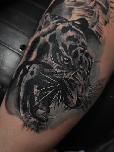 Explore massage therapy tattoo ideas, creative tattoo ideas in Valdosta, available at Acid Ink Tattoos