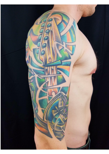 Explore wedding band tattoo ideas, creative tattoo ideas in Powell, available at Hummingbird Tattoo Studio