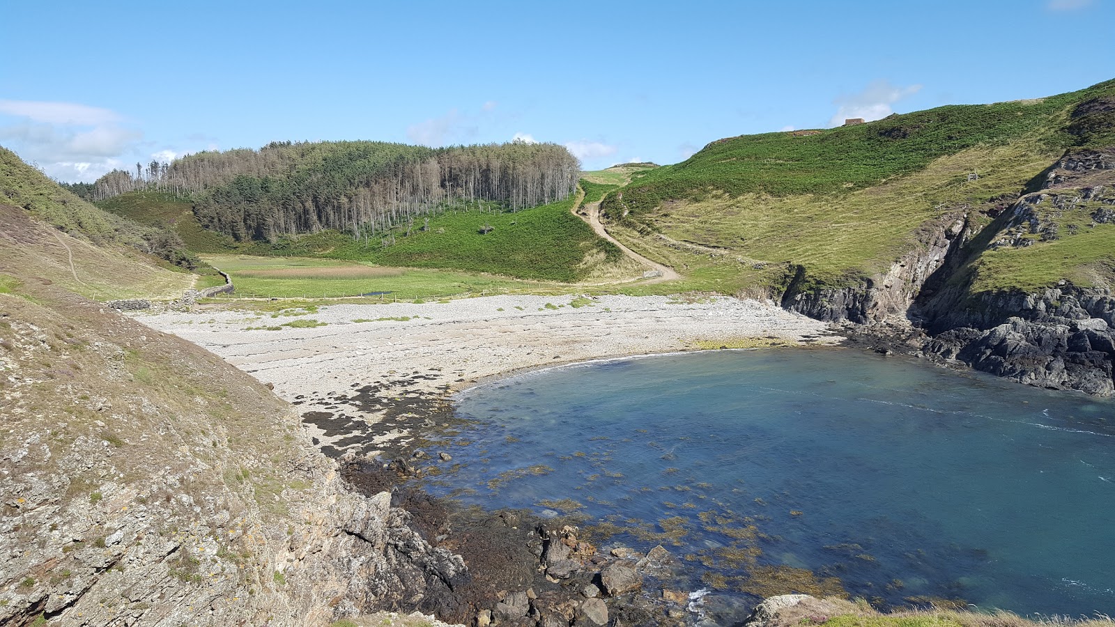 Foto di Traeth Ynys con una superficie del acqua cristallina