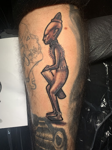 Explore female back tattoo ideas, creative tattoo ideas in Atlanta, available at Iron Palm Tattoos & Body Piercing Atlanta