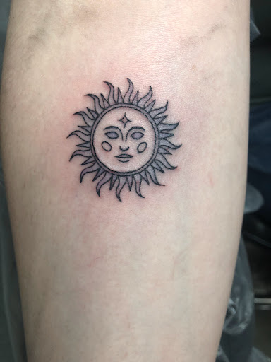 Find small cat tattoo ideas for your next unique tattoo in Adrian at Ambition Ink