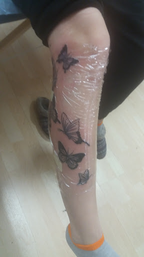 Explore rose tattoo ideas for females, creative tattoo ideas in Sacramento, available at 13 MAG TATTOO