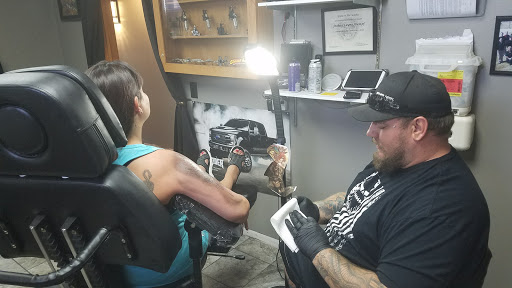 Explore anunnaki tattoo ideas, creative tattoo ideas in Little Falls, available at Skyline Tattoo Studio