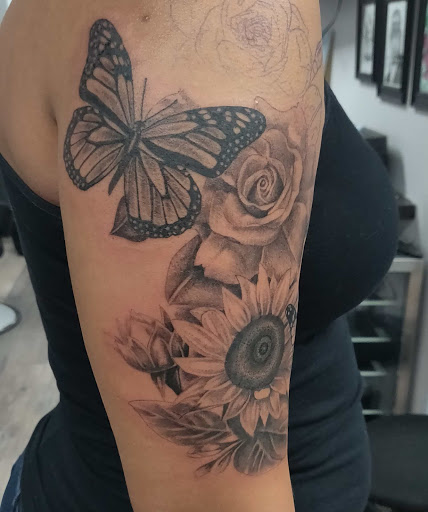 Explore camper tattoo ideas, creative tattoo ideas in Kissimmee, available at Precision Ink Tattoo Company